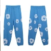 Sky blue trousers (white flower ring)