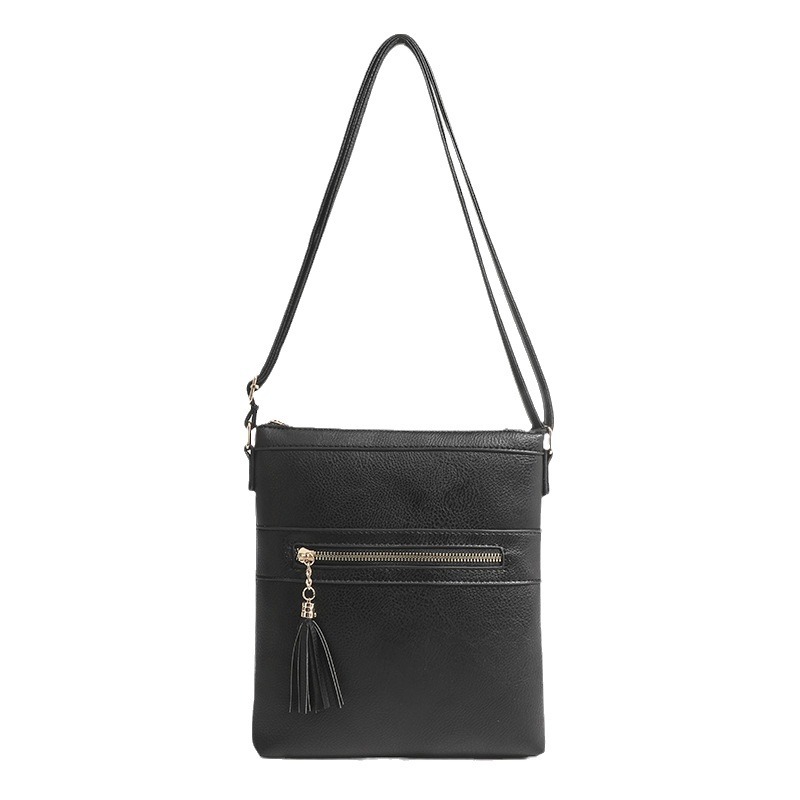 Dames schoudertas in retrostijl met kwastje en ritssluiting_voghion.com