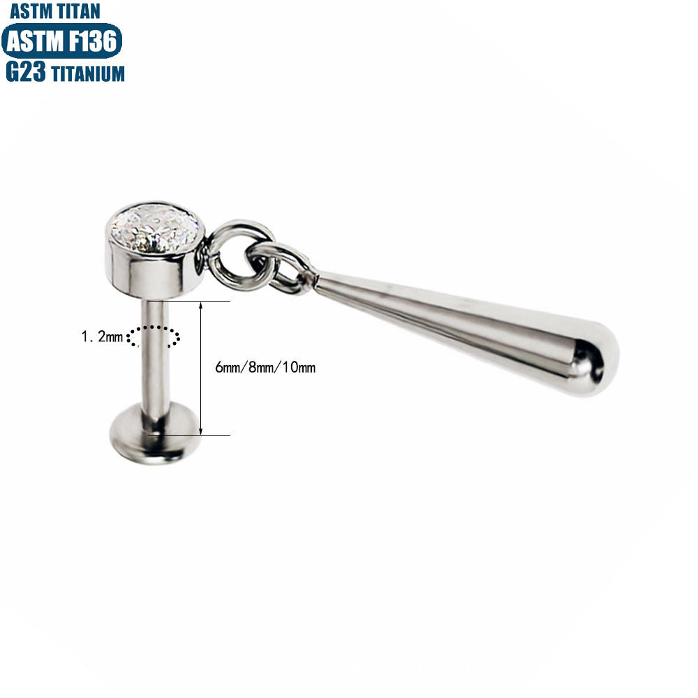 Silver pointed spike labret stud material detail
