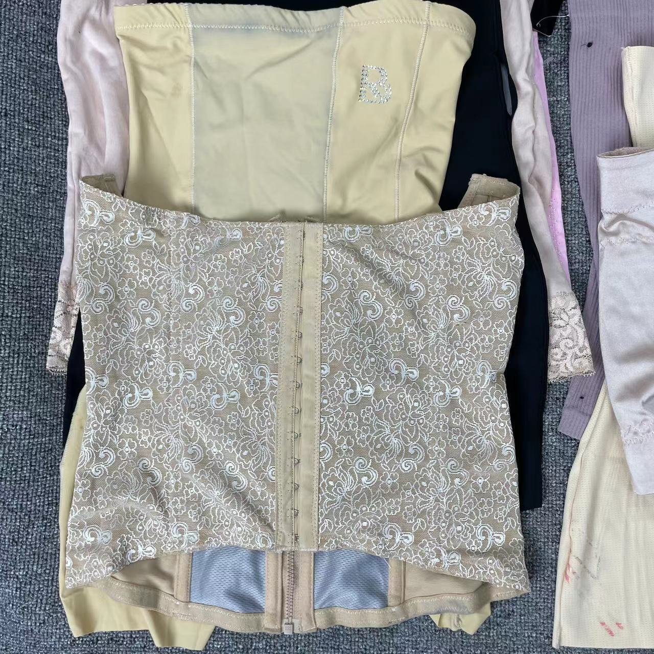 Inventario misceláneo bajo precio liquidación procesamiento defecto teñido vientre cinturón vientre pantalones superventas Comercio exterior ropa interior al por mayor