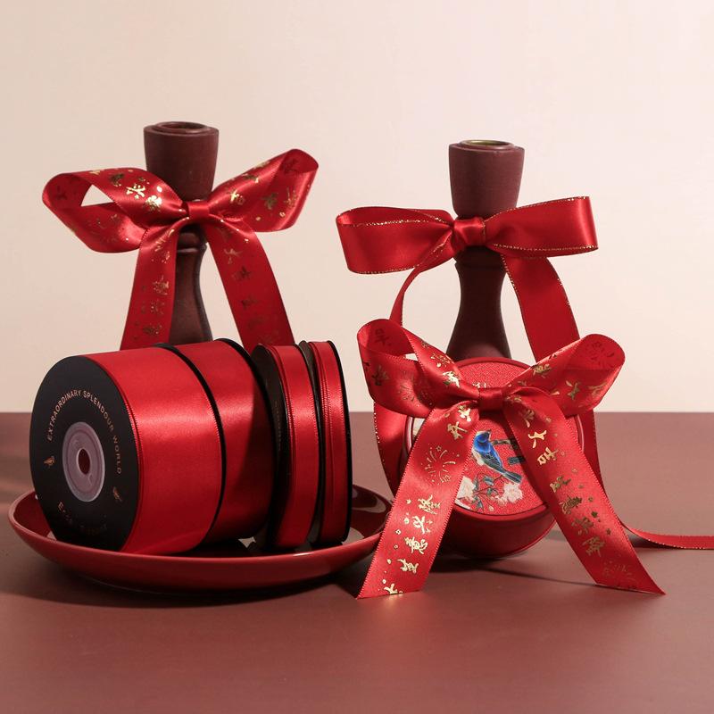 Bright red festival Jubilation Ribbon Bronzing word flower packing silk ribbon The opening Tait Business Xinglong Bandage Ribbon