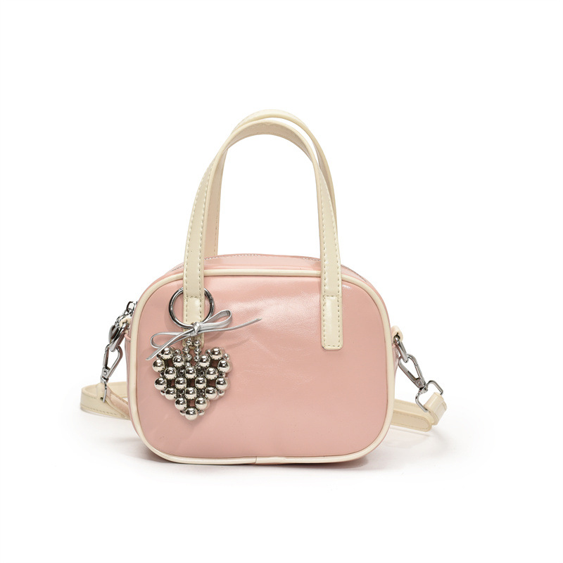 Bolsos populares de este año 2025 primavera nuevo bolso femenino con cuentas de amor bolso de hombro pequeño bolso de mensajero de color de contraste fresco