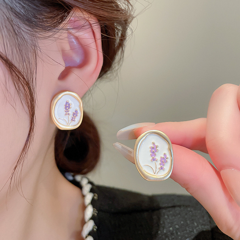 White earrings, flowered