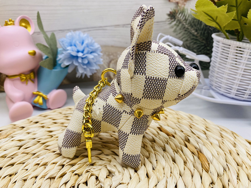 Bolsos de burro al por mayor cachorro red de cuero viejas flores dibujos animados pequeños par adornos de llaves de automóviles lindos
