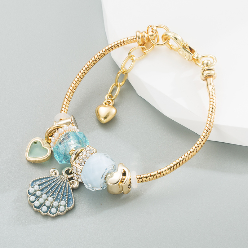 Fashion Heart Shape Shell Alloy Rhinestone Pearl Plating Bracelets display picture 3