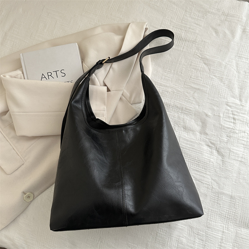 2025 primavera nueva moda bolsos de mano de hombro de gran capacidad bolsos tote bolsos de mujer bolsos de viaje bolsos versátiles para mujeres