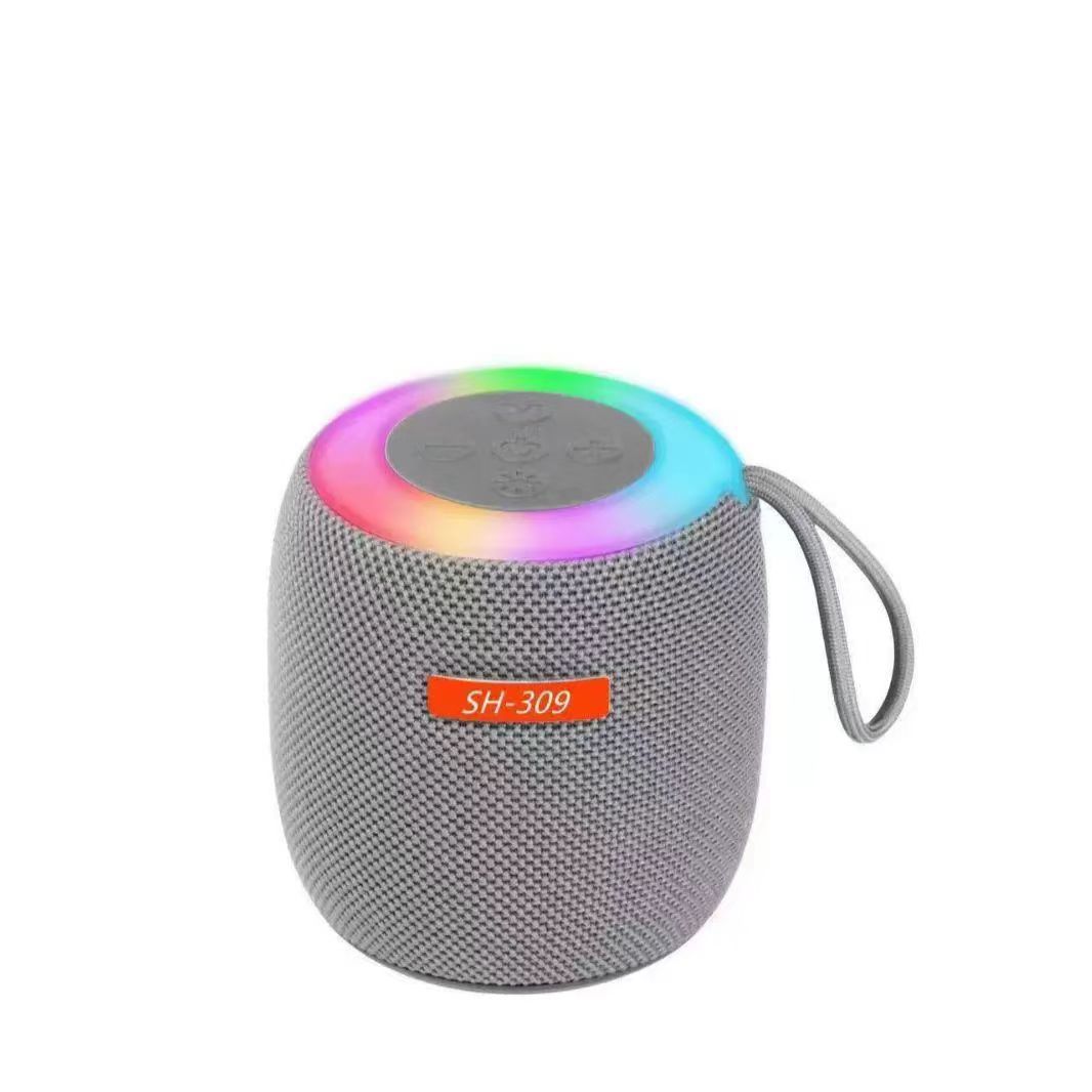 Transfronterizo SH309 tela Bluetooth mini altavoz de luz colorida gran volumen pequeño larga duración de la batería mayorista