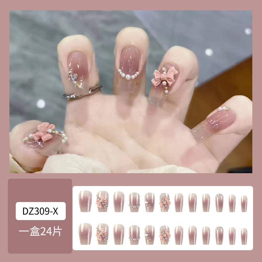 Chica caliente hecha a mano francesa usar uñas explosivas de arco de diamante de manicure 24 piezas de uñas falsas al por mayor