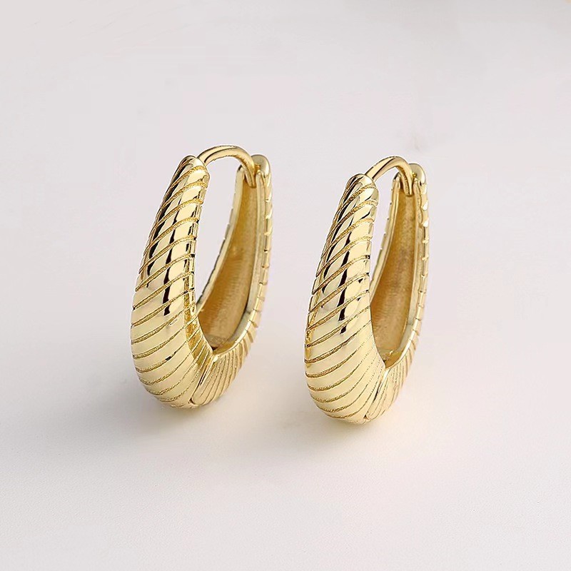 fashionable retro earrings with pigtail