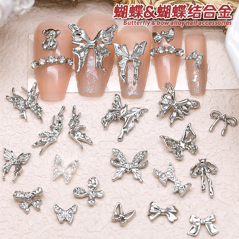 Manicure silver alloy jewelry light luxury three-dimensional bow metal big butterfly wings bow bear nail drill accessories
