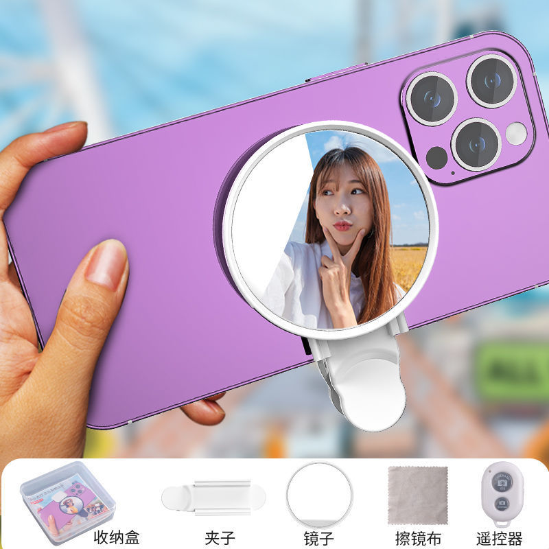 写真を撮る携帯電話の後ろには、自分で写真を撮るカメラがあります。|undefined