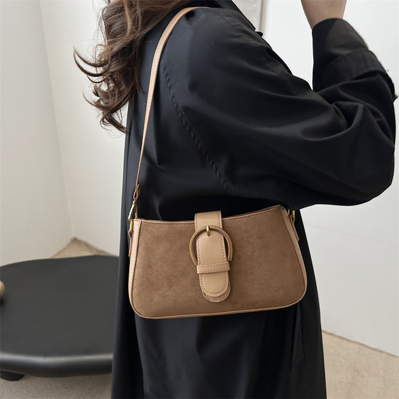 Bolso retro esmerilado para mujeres 2025 verano nueva moda moda de un hombro mochila textura simple bolso de palo