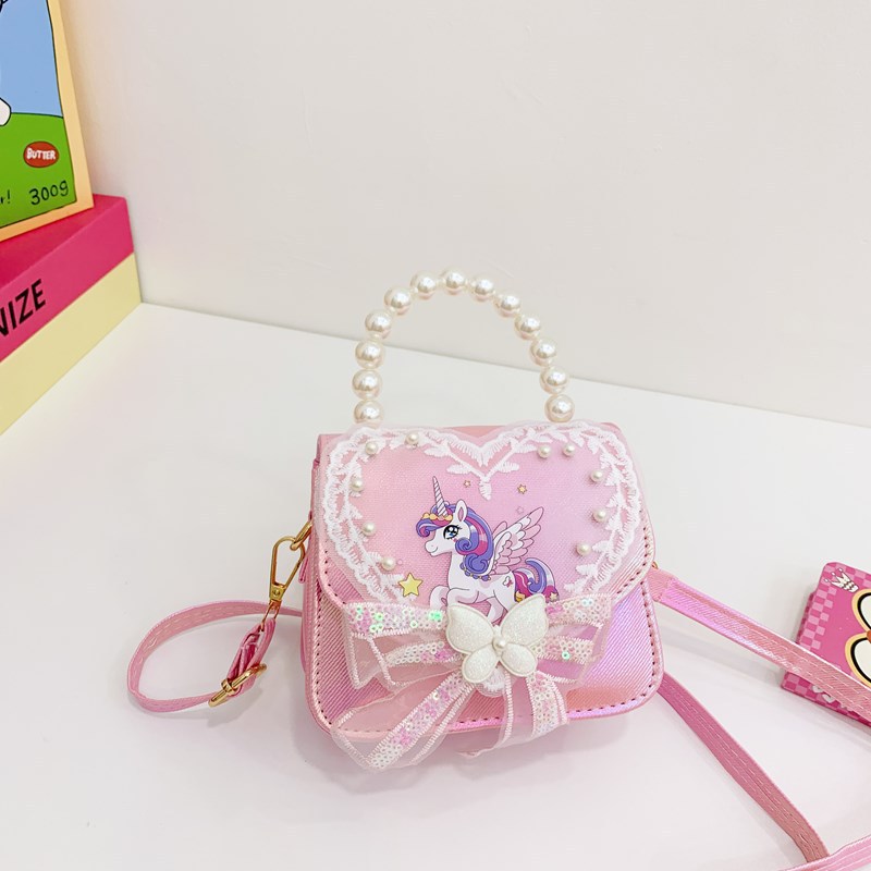 La niña transfronteriza Aisha bolso de hombro de este año, bolso de perla de moda popular, bolso de hombro para niños coreanos.