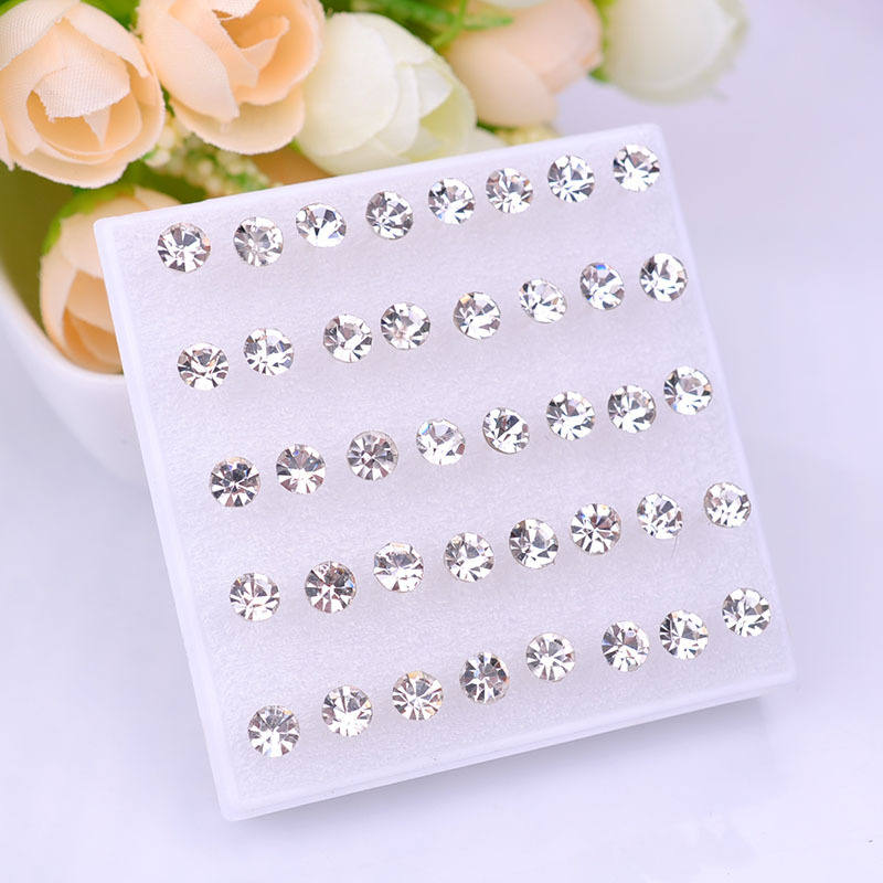 Pendientes de resina, pendientes de plástico, juego de joyería para oreja de mujer, aretes de hueso de la oreja, aretes pequeños en caja, aretes de hueso de la oreja PDD al por mayor