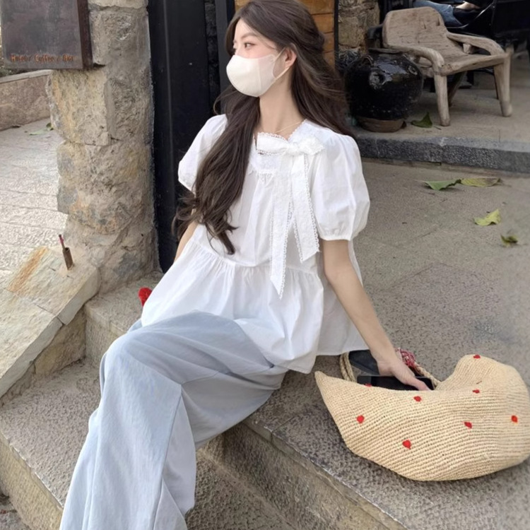 White lace summer shirt with bow