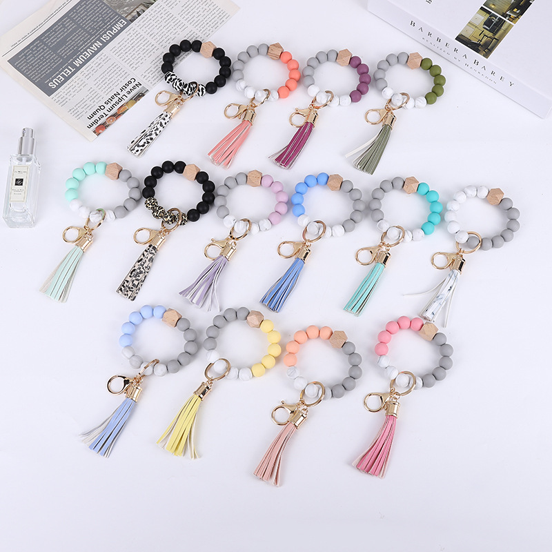 2026 New Style Silicone Beaded Bracelet with Tassel Wooden Beads Keychain Silicone Bracelet Food-Grade Silicone Beads Bracelet