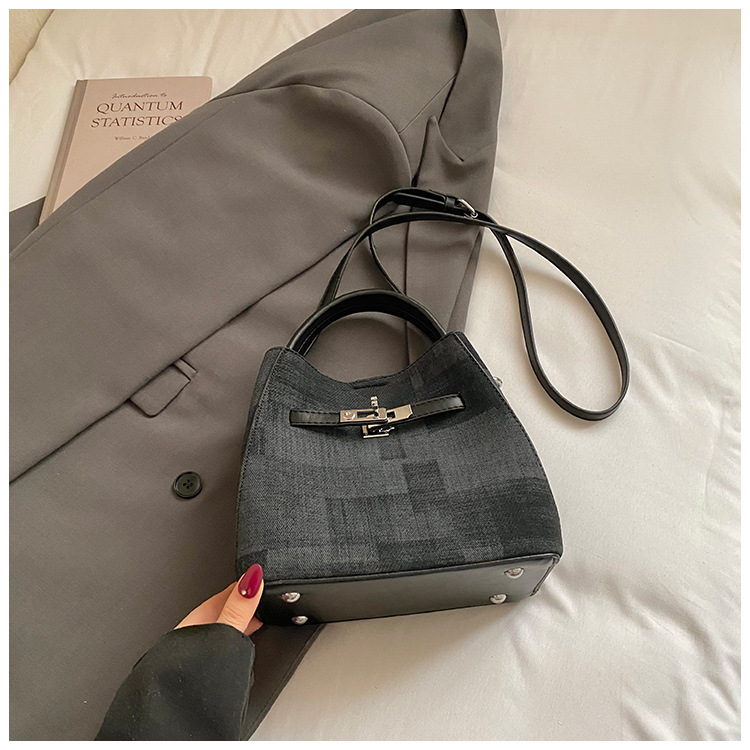 Comercio exterior transfronterizo coreano simple nicho de diseño de moda bolso de cubo para mujeres 2026 nuevo tipo de mujer mochila de hombro