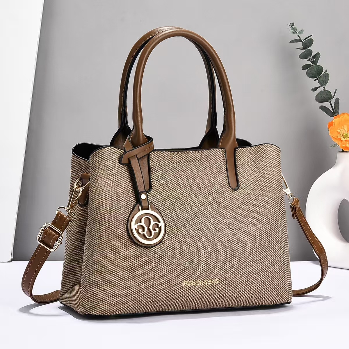 Bolso de mano universal nuevo bolso de hombro de moda bolso de mediana edad bolso de madre bolso de transporte casual bolso de mano