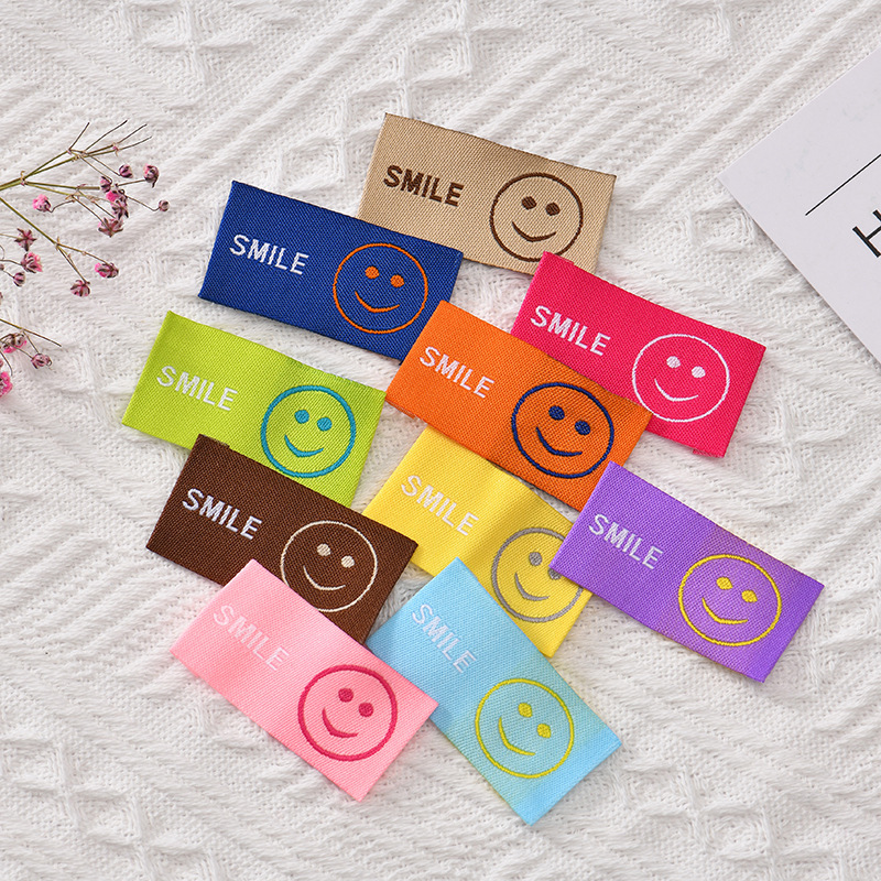 New Color Fashion Smiley Children's Clothing Cloth Label Children's Clothing Sweatshirt Trademark Cartoon Half Fold Nail Decorative Label New Color Fashion Smiley Children's Clothing Cloth Label Children's Clothing Sweatshirt Trademark Cartoon Half Fold Nail Decorative Label