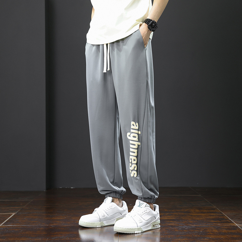 Pantalones pesados de estilo americano para hombres primavera y otoño marca de moda, pantalones juveniles, pantalones deportivos casuales largos sueltos