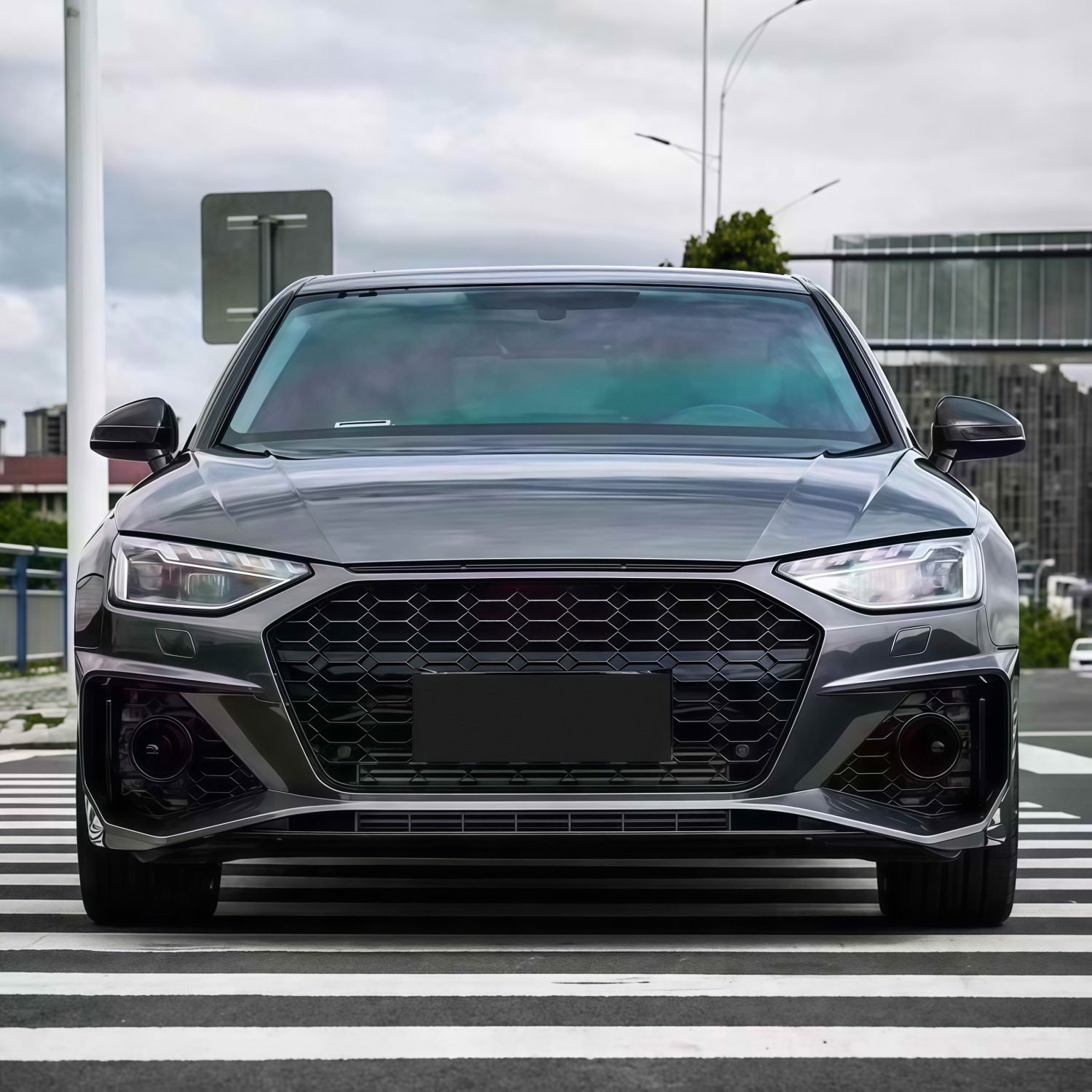 20-22 models suitable for Audi A4L, modified with an RS4-style front bumper, front grille, and front fascia
