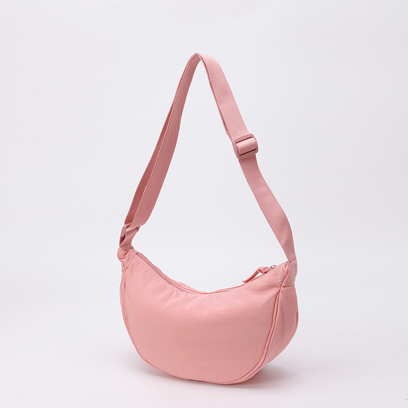 Bolso de tela pequeño bolso de moda ligero bolso de mochila de nylon transfronterizo mujer bolso de hombro casual versátil bolso de bolsas de bolsas de bollo de gran capacidad