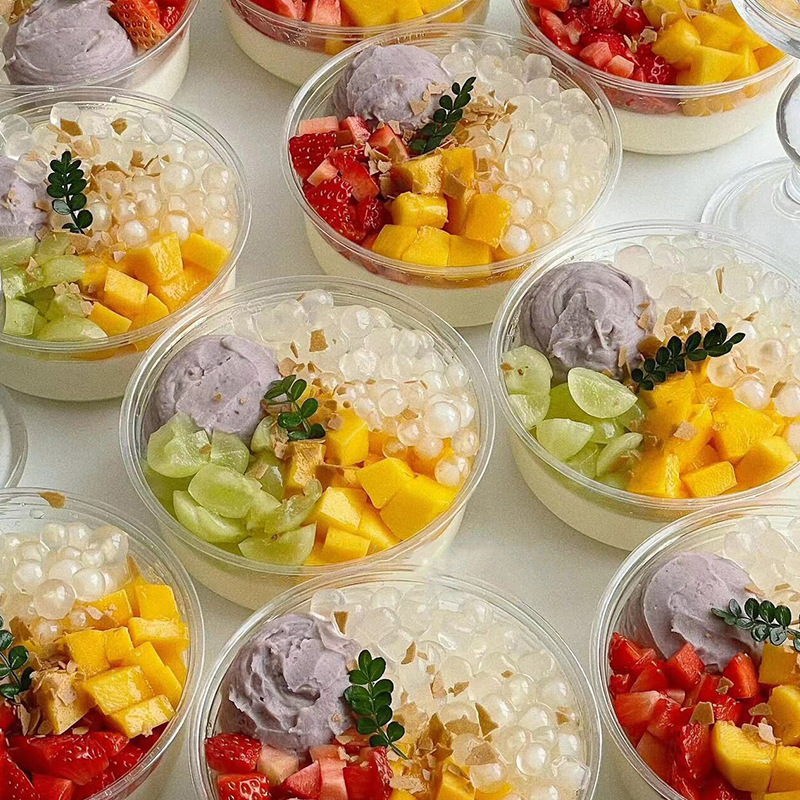 Taza de congelación de leche de coco, tazón de yogur extraído en frío, polvo de hielo asado, hierba de仙境, fruta pescada, postre, caja de embalaje transparente desechable