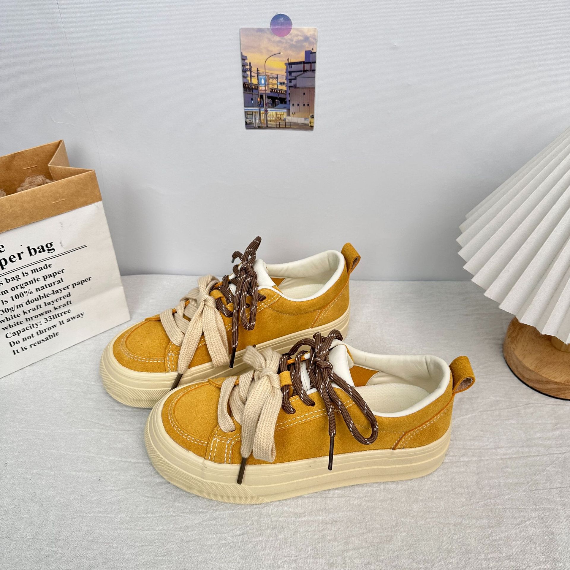 Yuanbo retro té con leche zapatos de lona niñas 2025 primavera y otoño suela gruesa japonesa negra marea nacional zapatos de suela blanda en nombre del cabello