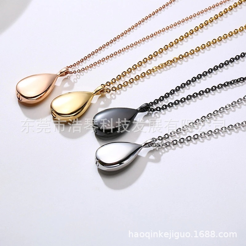 Amazon Venta caliente en forma de gota colgante de cenizas se puede abrir botella de perfume conmemorativa parientes mascota cenizas caja de joyería