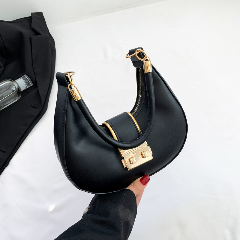 Bolso de axila simple y moderno 2024 nuevo diseño de nicho, estilo explosivo transfronterizo, bolso de luna nueva de un solo hombro de todo fósforo