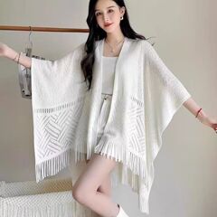 清新な文芸流蘇百合チャイナドレスのマントの薄いエアコンのマントの透かし彫りの外にチャイナドレスのカーディガンの白いマントを組み合わせます。