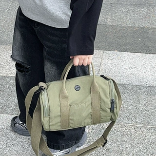 韩版男女童单肩包时尚休闲日系宝宝手提圆筒包新款儿童斜挎枕头包