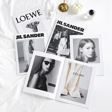 INS封面人物英文杂志24页网红高颜值搭配艺术背景墙摆件拍照道具