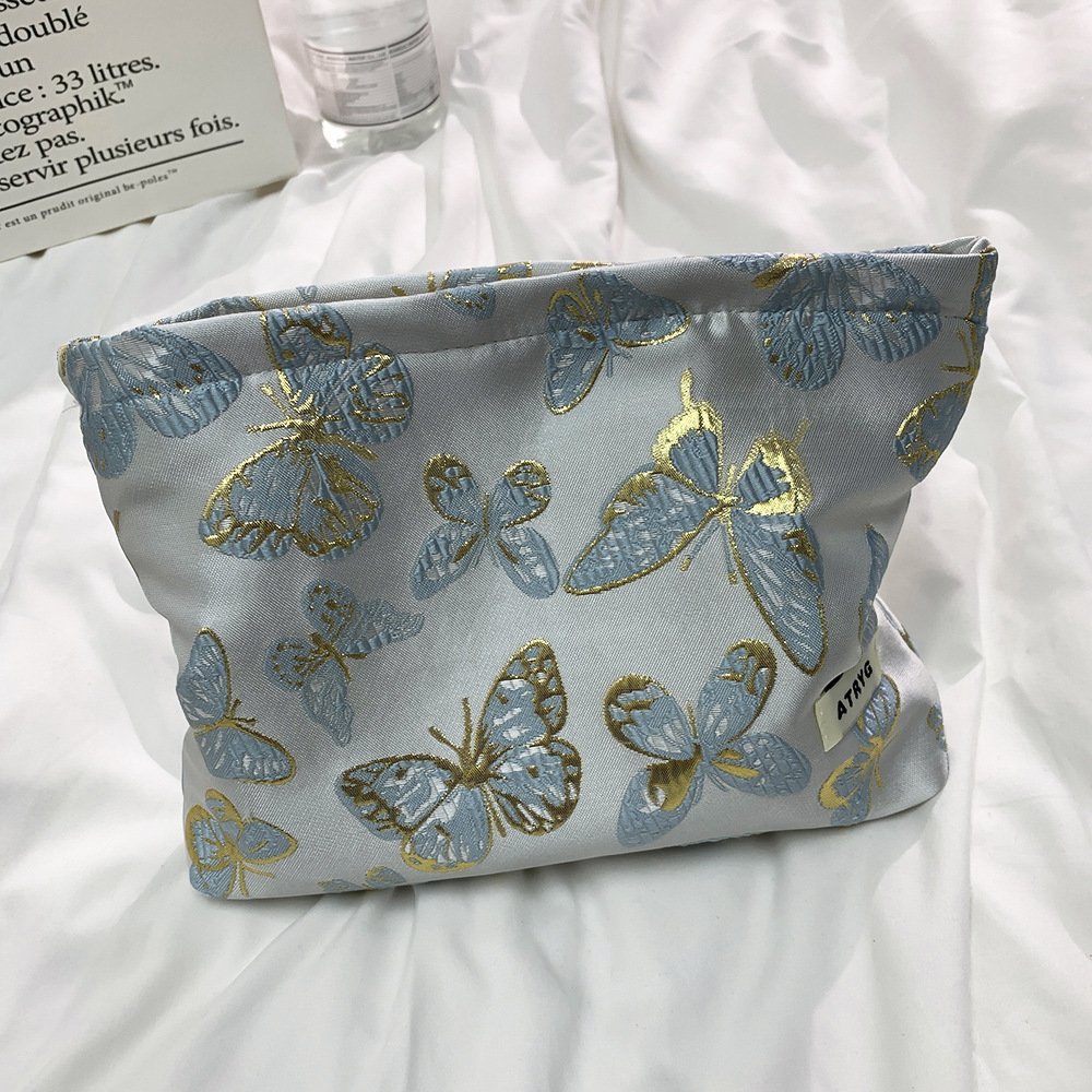 Bolso de maquillaje mariposa tricolor azul