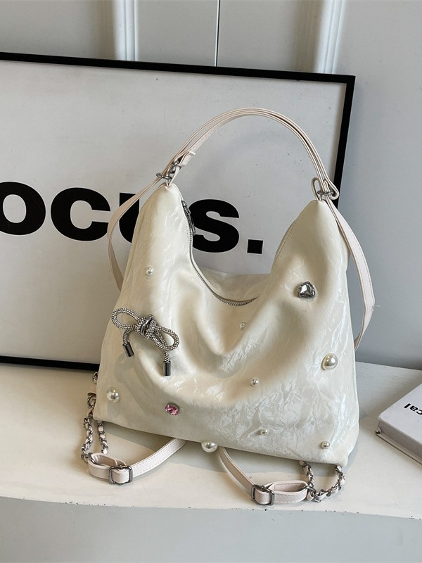 Bolsa de gran capacidad para mujeres 2024 nuevo nicho de alto nivel de diseño de diamantes de viaje multifuncional mochila de doble hombro inclinada