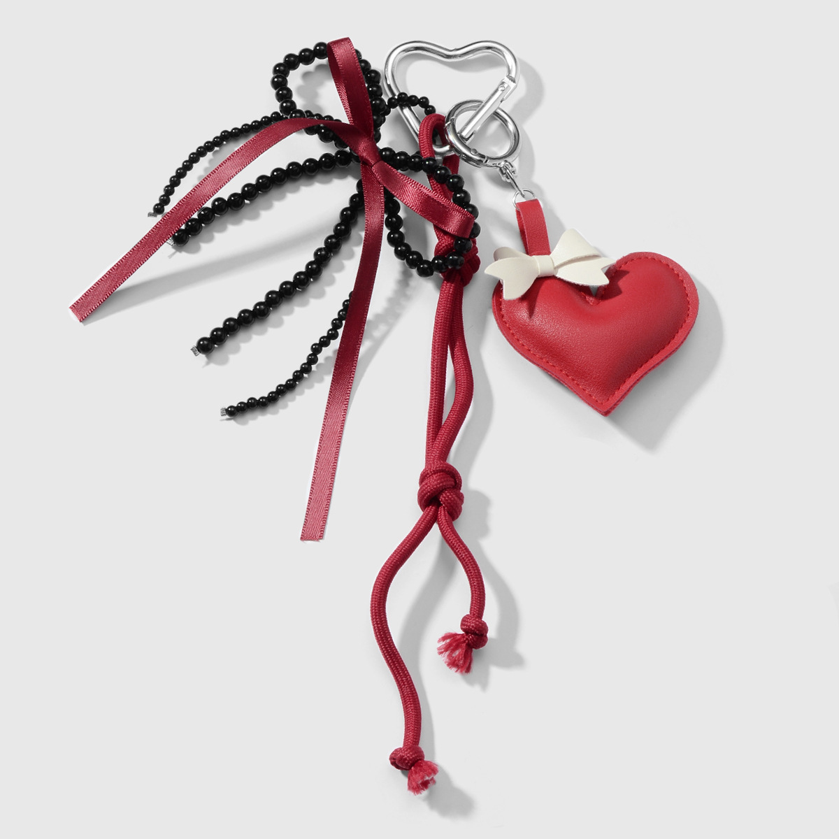 Primavera nuevo estilo ins dulce y cool moda personalidad leopardo amor cuentas hechas a mano arco llavero de cereza