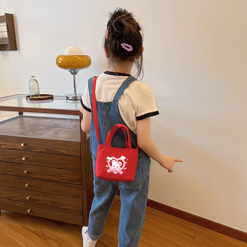 Cartoon bear, bolsas de hombro para niños y niñas, impresión de aire extranjero, bolsas de mano para bebés dulces, bolsas para niños 2025 nuevas bolsas para niños