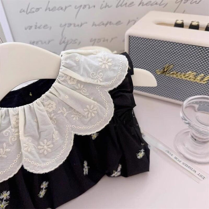 Xianning siete ropa para niños coreanos verano nuevo estilo bordado cuello de hoja de loto vestido floral negro falda chaleco sin mangas para niñas