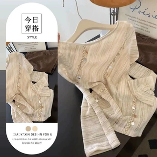 2026年新款设计感别致长袖针织衫女轻奢风显气质不规则镂空上衣潮