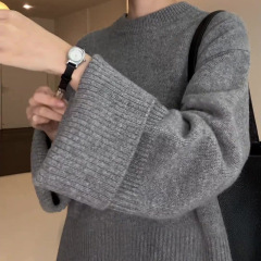 灰色の柔らかいモチモチのセーターの婦人服の秋冬の新型の怠惰でゆったりしている小さい大衆の丸首はフォークのニットのロシアの対外貿易を開きます。