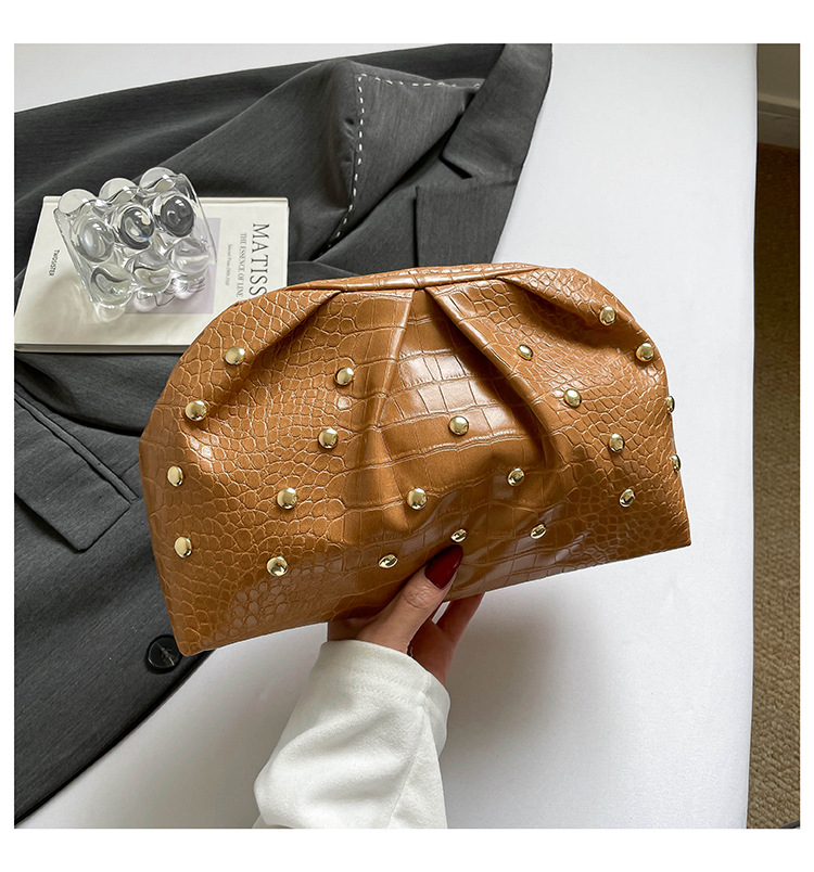 2026 tendencia de primavera nuevo clip de textura simple clavos de hongo de moda de textura plegada bolso de mano mujer