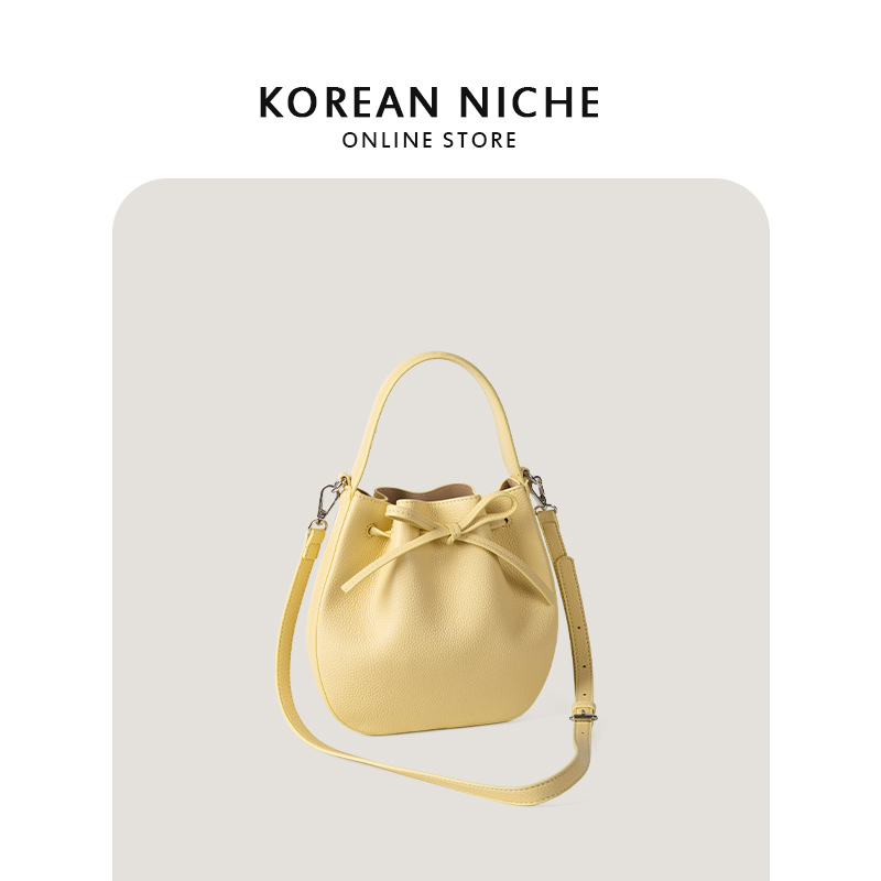 2024 nuova versione coreana borsa a tracolla in morbida pelle con motivo litchi, borsa a secchiello con fiocco e coulisse_voghion.com