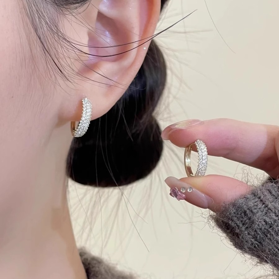 Small design sophisticated earrings with zircon
