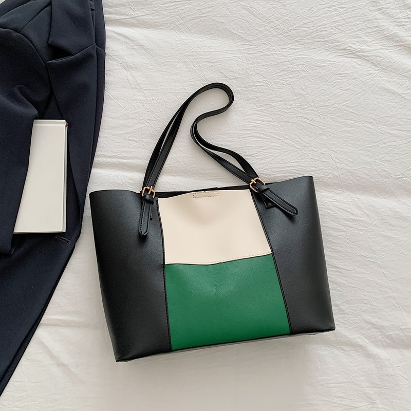 Bolso de cercanías atmosférico para mujer, estilo occidental de gran capacidad 2025 verano nuevo estilo retro simple bolso portátil de un solo hombro para mujer