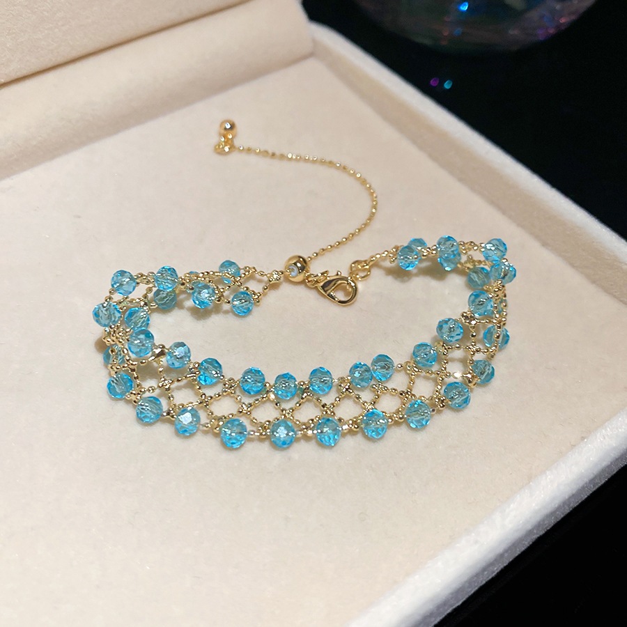 26 pulseras - doradas - azules