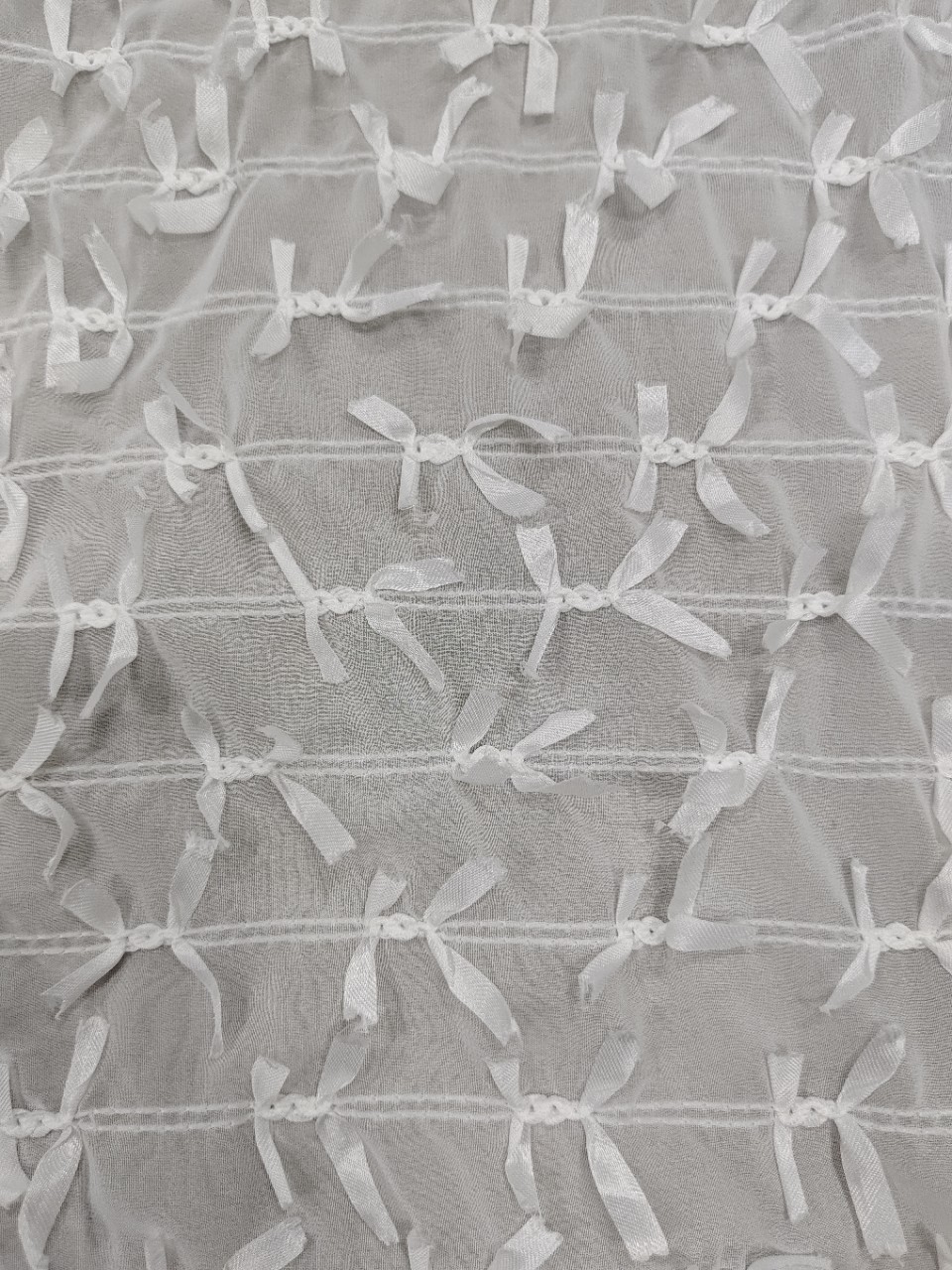 现货供应网布绣花手工钩花蝴蝶结提花童装裙子春夏爆款