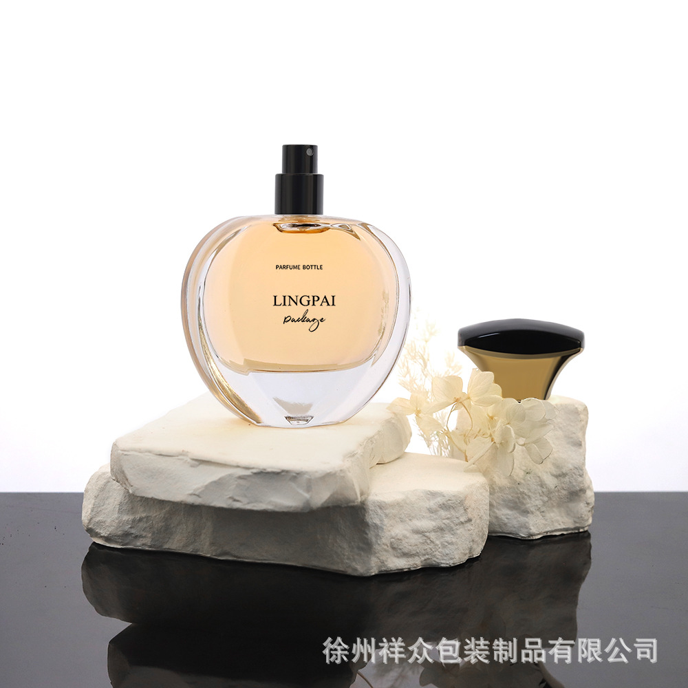 Botellas de perfume de fondo redondo y grueso de alta gama transfronterizas, botellas vacías de cosméticos de vidrio, botellas de spray de perfume de presión 50 ml