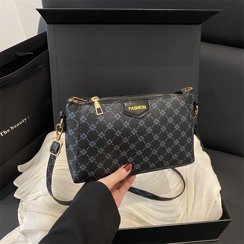 Bolso de hombro para mujer a juego diario 2025 verano nuevo estilo PU moda europea y americana impresión retro letras bolso de mensajero