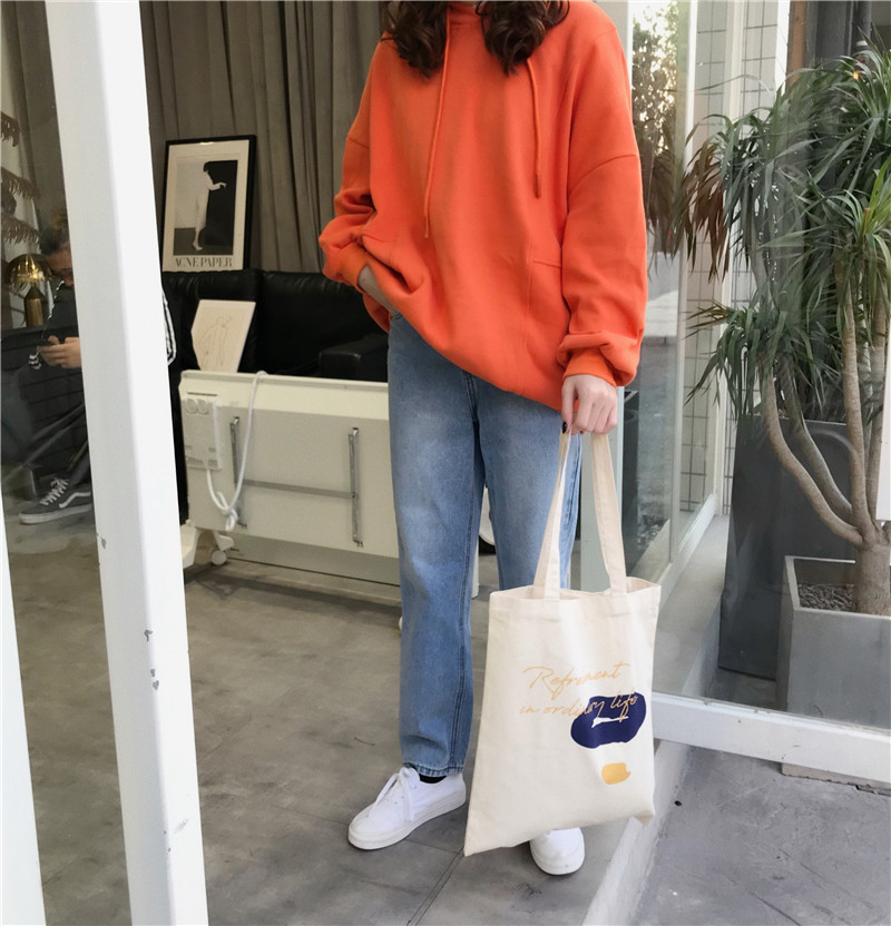 E131 canvas bag, Korean-style ins hand-held shoulder bag, color block letter graffiti shopping bag, female student's search for sources undefined