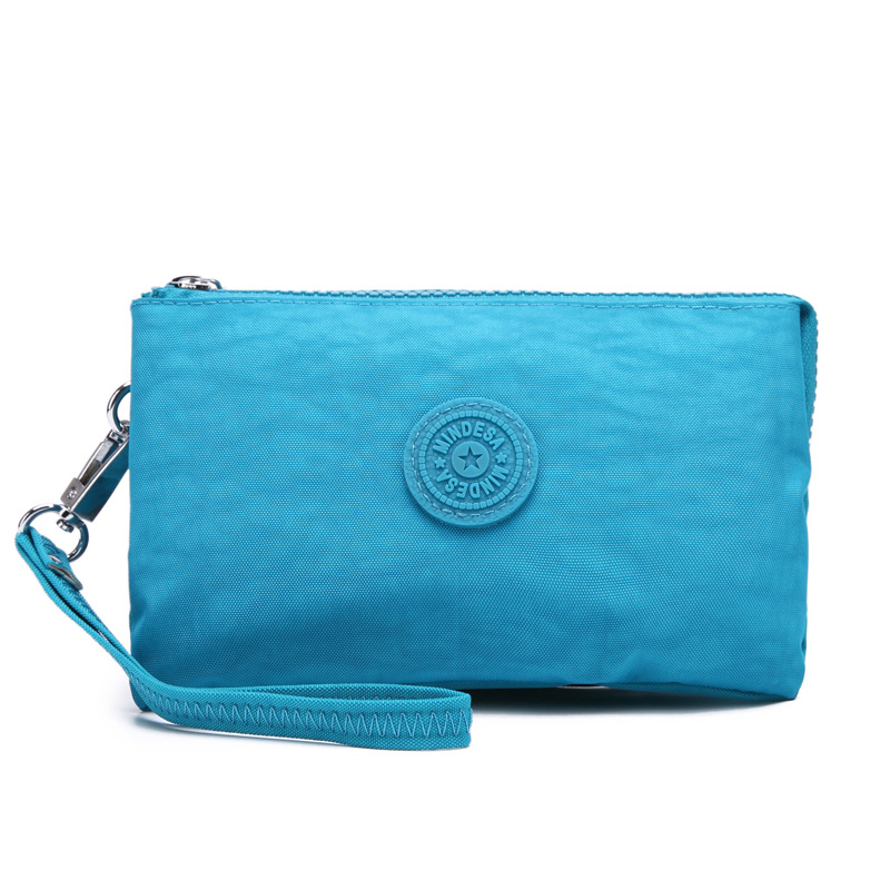 Bolsa de mano de nylon multicapa de gran capacidad a prueba de derrames de agua de mujer simple de moda larga cremallera cambio pasaporte bolso móvil